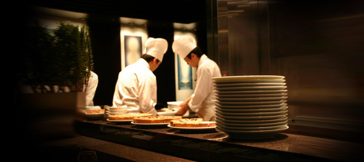 Bo Lings chefs preparing signature Chinese dishes